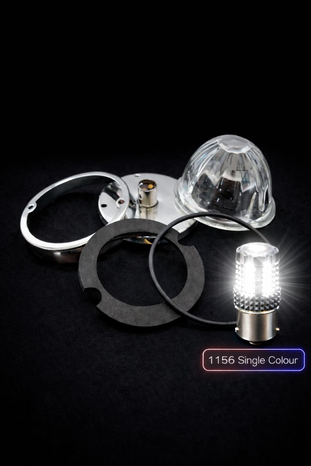 Clear Glass Watermelon Disassembled With A 1156 Globe illuminating white on a black background